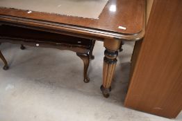 A Victorian style mahogany banquetting table in the Gillows style