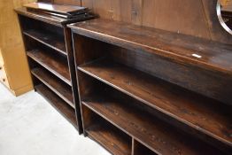 Two dark stained pine bookshelves, width 122 and 115cm