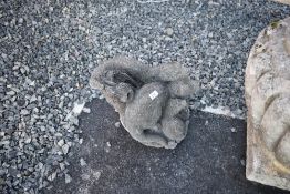 A garden ornament modelled as otter