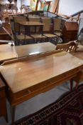 A vintage dressing of stylised form, width approx. 120cm