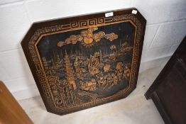 A carved oriental panel, approx. 61 x 61cm