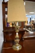 A vintage gilt work table lamp