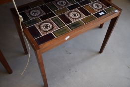 A vintage teak and tile top occasional table