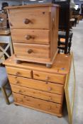 A modern pine bedroom chest, two over three drawer, and similar bedside chest of three drawers