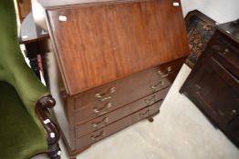 A reproduction mahogany bureau, width approx. 76cm