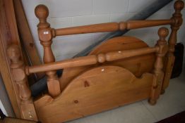 A modern pine bed frame, width approx. 166 (to take mattress width approx 150cm)