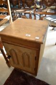 A stripped pine pot cupboard