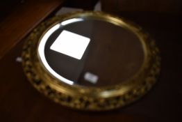 A gilt frame wall mirror of circular form, diameter approx. 51cm