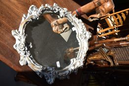 A reproduction Rococo style wall mirror, approx. 64 x 47cm