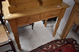 A natural pine side or dressing table, approx. width 89cm