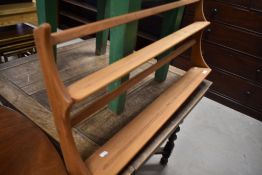 A stripped Ercol wall shelf, width approx. 97cm