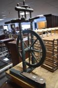 A traditional stained frame spinning wheel