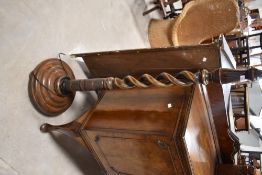 An early to mid 20t Century mahogany standard lamp