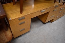 A vintage stylised dressing table and two similar bedside cabinets