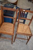 A pair of Victorian cane seated bedroom chairs