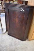 A 19th Century oak corner cabinet, height approx. 108cm