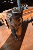 A modern carved hardwood elephant style table