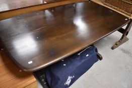 A dark Ercol refectory style dining table, approx. 152 x 85cm