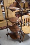 A 19th Century walnut corner whatnot having inlaid decoration, height approx. 140cm