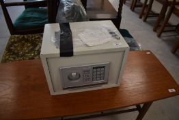 A Detroit electronic safe, with keys and operating instructions