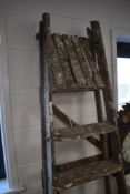 A set of wooden step ladders