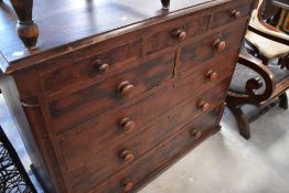 A 19th century scumbled or grained pine chest of drawers, having three short upper drawers over
