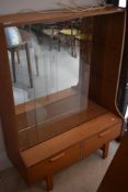 A vintage teak effect display cabinet with drawers to base, width approx. 91cm