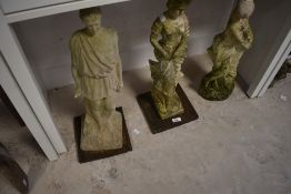 Three resins garden statues and a frog water feature