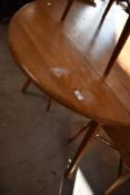 An Ercol drop leaf dining table