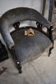 A Victorian mahogany framed tub chair with later upholstery