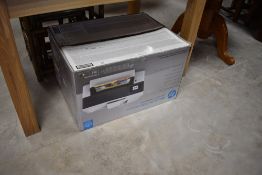 A boxed HP Officejet Pro-7720 wide format printer