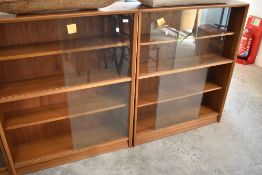 A pair of Herbert Gibbs glass fronted bookcases, width 92, height 112cm