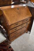 A 19th Century Walnut bureau in the George III style , width approx. 86cm