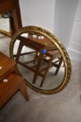 A gilt frame wall mirror of circular form, diameter approx. 58cm