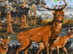 20th Century School, needleworks, Two mid-20th Century tapestries depicting deer, framed and under