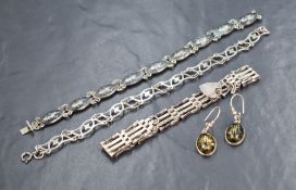 A small assortment of silver and white metal jewellery, comprising a four bar gate bracelet with