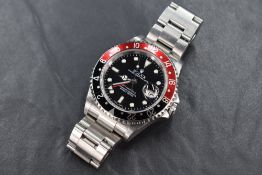 A Rolex Oyster Perpetual Date GMT-Master II stainless steel automatic wristwatch bought c2005-