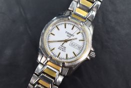 A Tissot PR100 automatic stainless steel wristwatch, the white dial with gold baton numerals and