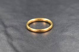 A 22ct gold wedding band, ring size N-O, 3.3g