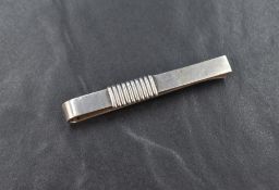 A silver Georg Jensen tie clip, having stylised banding, model no. 52A, clip length 5.5cm, 9.7g