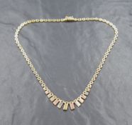 A three colour 9ct gold necklace, the square link chain with graduated alternating triple tone