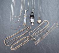 A selection of silver and white metal pendants and necklaces, most stamped sterling/925 including