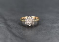 A 9ct gold diamond cluster ring, the floral motif cluster having a total of approximately 0.50ct,