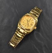 A ladies gold plated Omega Seamaster automatic wrist watch having a baton dial with date aperture to