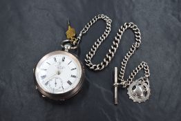 A large silver key wound pocket watch by Waltham, movement no: 5457978, having a Roman numeral