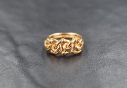 An 18ct gold ring, the knotted chain link motif band having pierced shoulders, ring size L-M, 5.5g