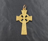 A 9ct gold Celtic cross pendant, having decorative engraved detail, 5.2cm including loop, 3.8g