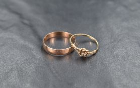 A 9ct rose gold wedding band, size Q, and small 9ct gold knot ring with central cubic zirconia, size