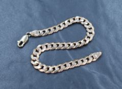 A 9ct rose gold curb link bracelet, 21.5cm, 15.7g