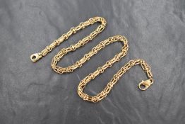 An 18ct gold fancy link chain, having yellow gold paperclip links with white gold links, 48.5cm,